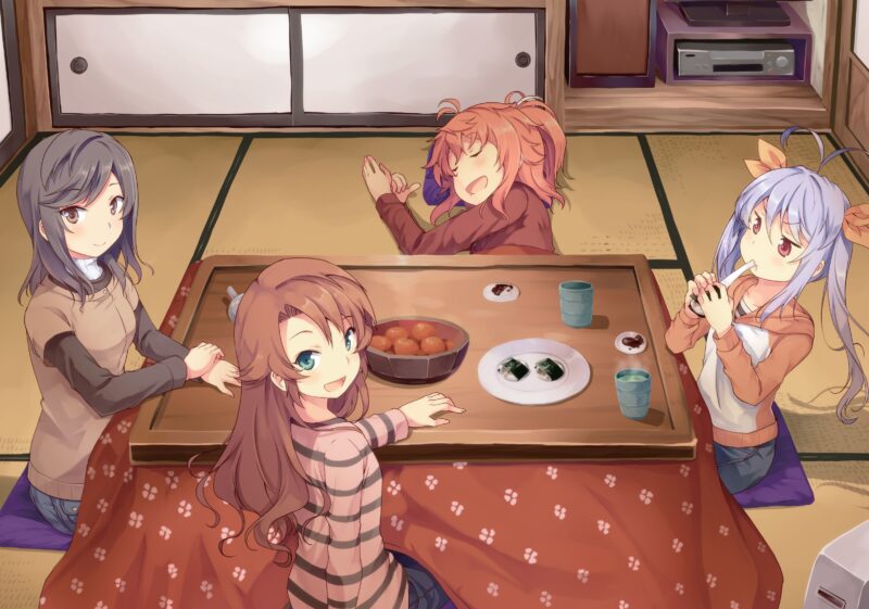 Main cast of characters of Non Non Biyori (Hotaru, Komari, Natsumi, and Renge) sitting around the kotatsu