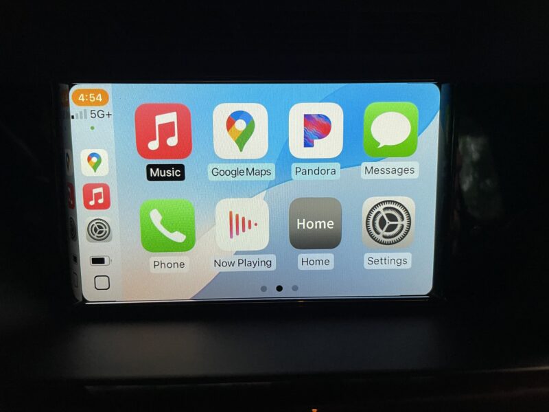 Apple CarPlay on the infotainment screen of a 2014 Mercedes Benz GLK 250, with 8 icons visible (2 rows of 4)